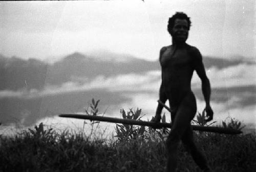 Samuel Putnam negatives, New Guinea; Inatunik walks by