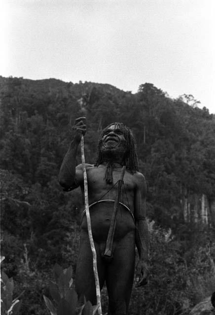 Samuel Putnam negatives, New Guinea; Polik standing on the mt. side