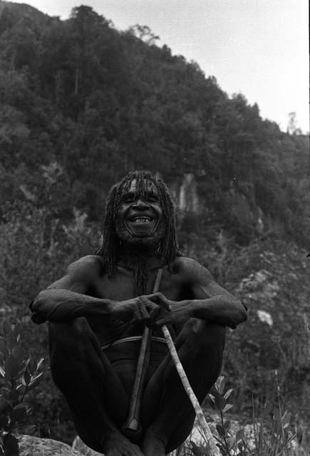 Samuel Putnam negatives, New Guinea; Polik sitting and laughing