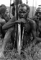 Samuel Putnam negatives, New Guinea; Alugu waits on the Tokolik with his bow and arrow