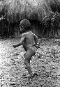 Samuel Putnam negatives, New Guinea; a little boy in Wuperainma I; running around