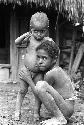 Samuel Putnam negatives, New Guinea; 2 little boys point at the camera