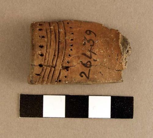 Ceramic pipe bowl fragment