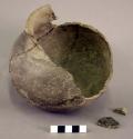 Ceramic jar, partial vessel, flared neck, rounded base, shell temper