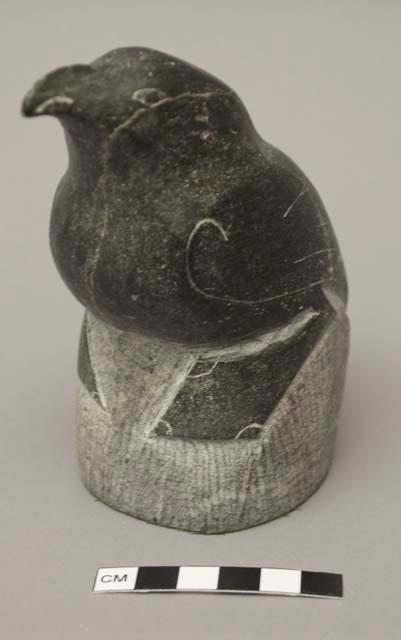 Carved black stone bird