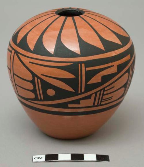 Round seed pot, black on red, polished black decoration; signed G. Sandia Jemez