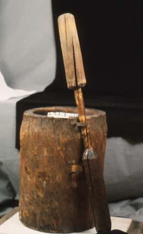 Mortar and pestle, used for pounding corn