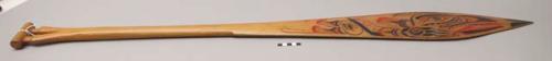 Canoe paddle; carved on both sides, painted in black and red on one side; signed Carol Easton / Port Simpson