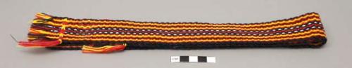 Woven belt in red, black, yellow and white