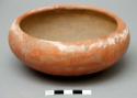 Redware bowl, squat, faint design on shoulder