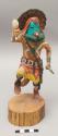 Dancing green-faced katsina with rattle; signed A. Miles Navajo 96 Yei