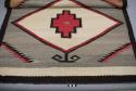Navajo rug with central double diamond design, gray background, black, red and white wool