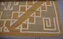 Navajo rug with geometric design; gray, rust and white wool