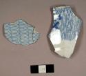 Whiteware sherd with blue on white transfer print, one bowl rim sherd and two mend together