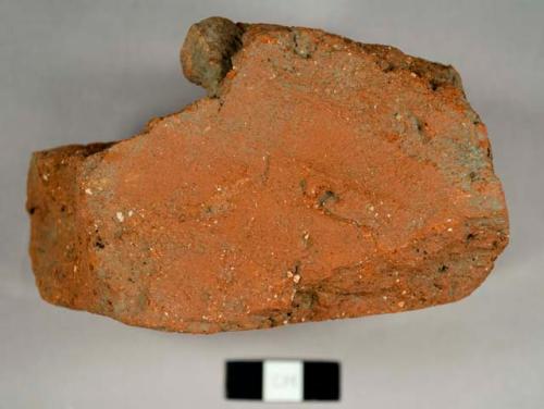 Red and orange brick fragments, including some handmade