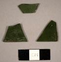 Olive green flat glass fragments