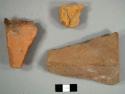 Brick fragments, including one handmade fragment