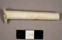 White kaolin pipe stem with "Davidson" impressed on one side and "Glasgow" impressed on the other