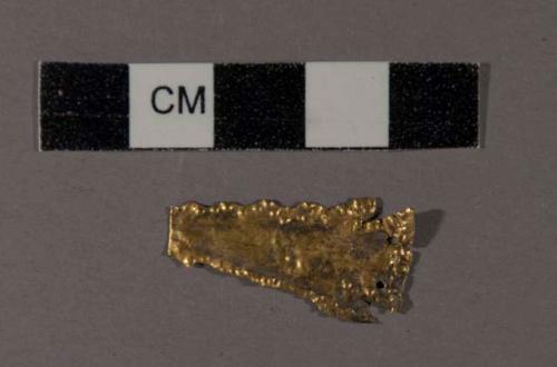 Gold ornament in shape of projectile point