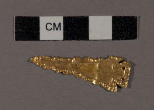 Gold ornament in shape of projectile point