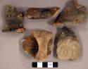 Ceramic, earthenware rim and body sherds, shell-tempered, incised and punctate, one with strap handle; possible ramey incised