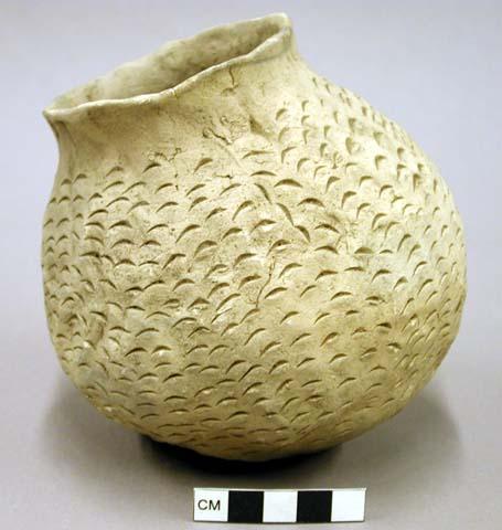 Tooled pottery jar