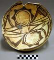 Bowl, polacca polychrome style c. int: Zuni rain bird design; ext: slipped, no d