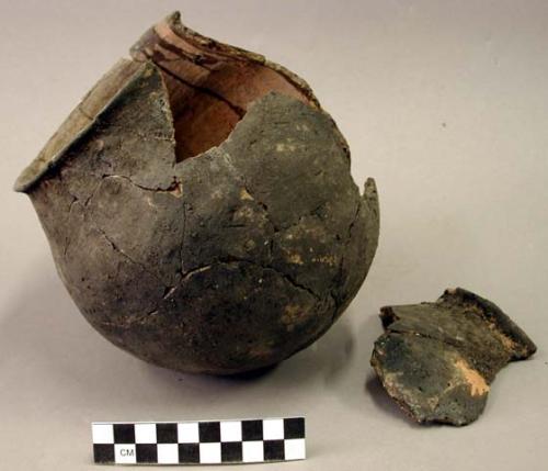 Ceramic jar, flared lip, mended, 3 sherds inside