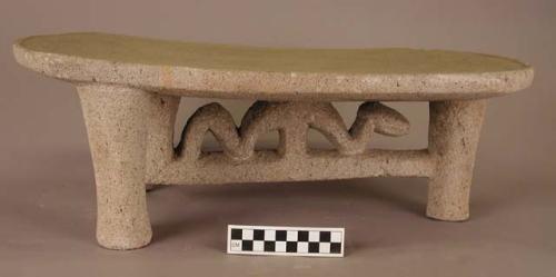 Tripod stone metate