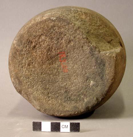 Stone cylinder, concave at both ends