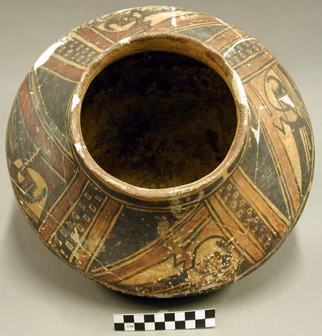 Ceramic jar, polychrome exterior, flared rim, rounded base, reconstructed