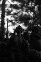 Samuel Putnam negatives, New Guinea; women near RG's tent doing Etai, Haniake and little girl in evening