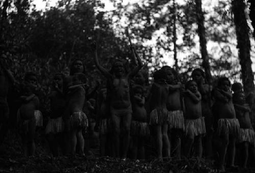 Samuel Putnam negatives, New Guinea; Haniake with hands upraised dances