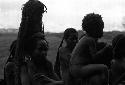 Samuel Putnam negatives, New Guinea; a group of women and children; some on the shoulders of the girlsand women; outside the sien forest at Homoak