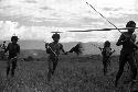 Samuel Putnam negatives, New Guinea; men dancing; going in a counter clockwise direction on the Liberek