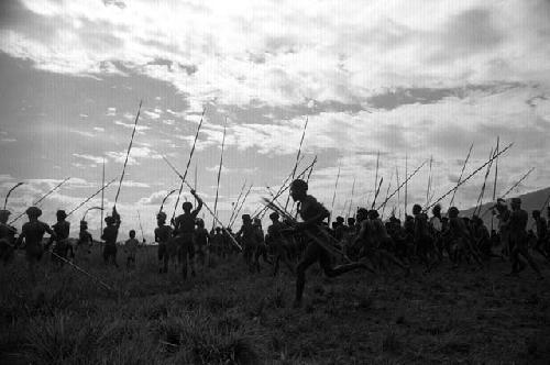 Samuel Putnam negatives, New Guinea; warriors dancing on their way to the Liberek