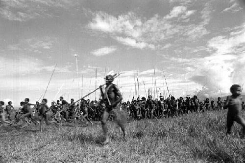 Samuel Putnam negatives, New Guinea; group of warriors on their way to the Liberek