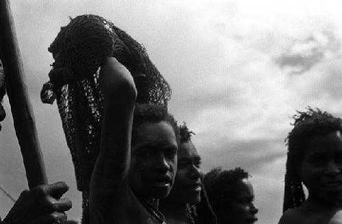 Samuel Putnam negatives, New Guinea; women look at camera during Etai