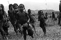 Samuel Putnam negatives, New Guinea; women running clockwise direction