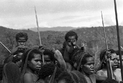 Samuel Putnam negatives, New Guinea; the women and children on their back; dancing