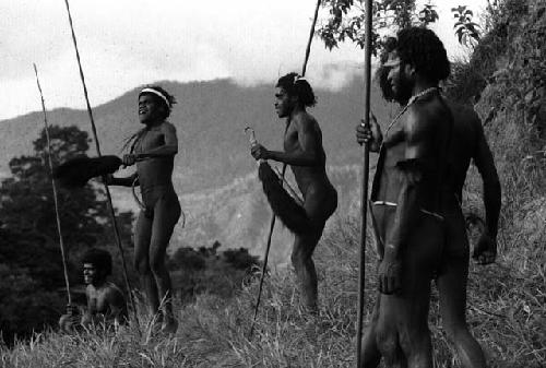 Samuel Putnam negatives, New Guinea; several warriors shouting at the enemy