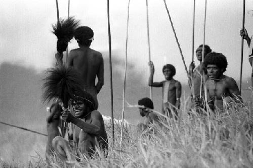 Samuel Putnam negatives, New Guinea; men jirring in the end of the Warabara a the Wittaia