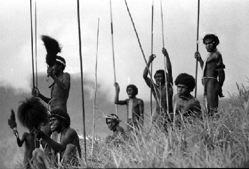 Samuel Putnam negatives, New Guinea; men jirring in the end of the Warabara a the Wittaia