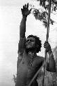 Samuel Putnam negatives, New Guinea; one man shouts at the enemy
