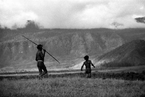 Samuel Putnam negatives, New Guinea; men running home