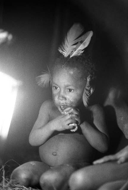 Samuel Putnam negatives, New Guinea; Natorek; feathers in his head