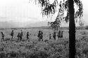 Samuel Putnam negatives, New Guinea; women start north on the trail outside of Homoak