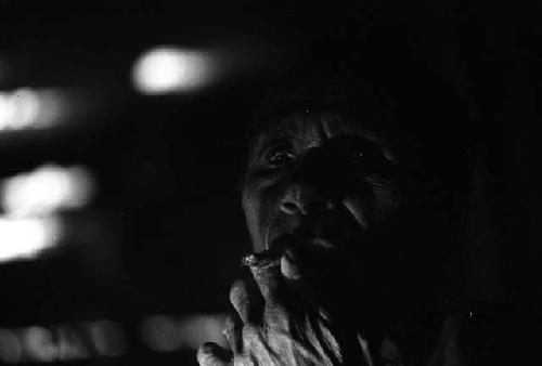 Samuel Putnam negatives, New Guinea; Aneake smoking a cigarette