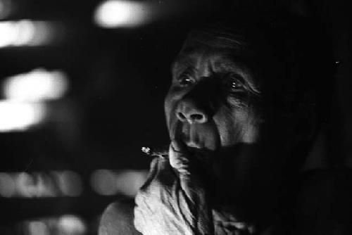 Samuel Putnam negatives, New Guinea; Aneake smoking a cigarette