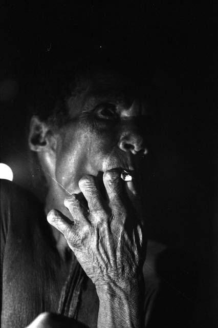 Samuel Putnam negatives, New Guinea; Aneake smoking a cig